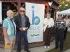 Four of BI's oldest residents pose with the new logo