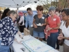BI Special Events Director Rita Pacyga serves cake to BI residents